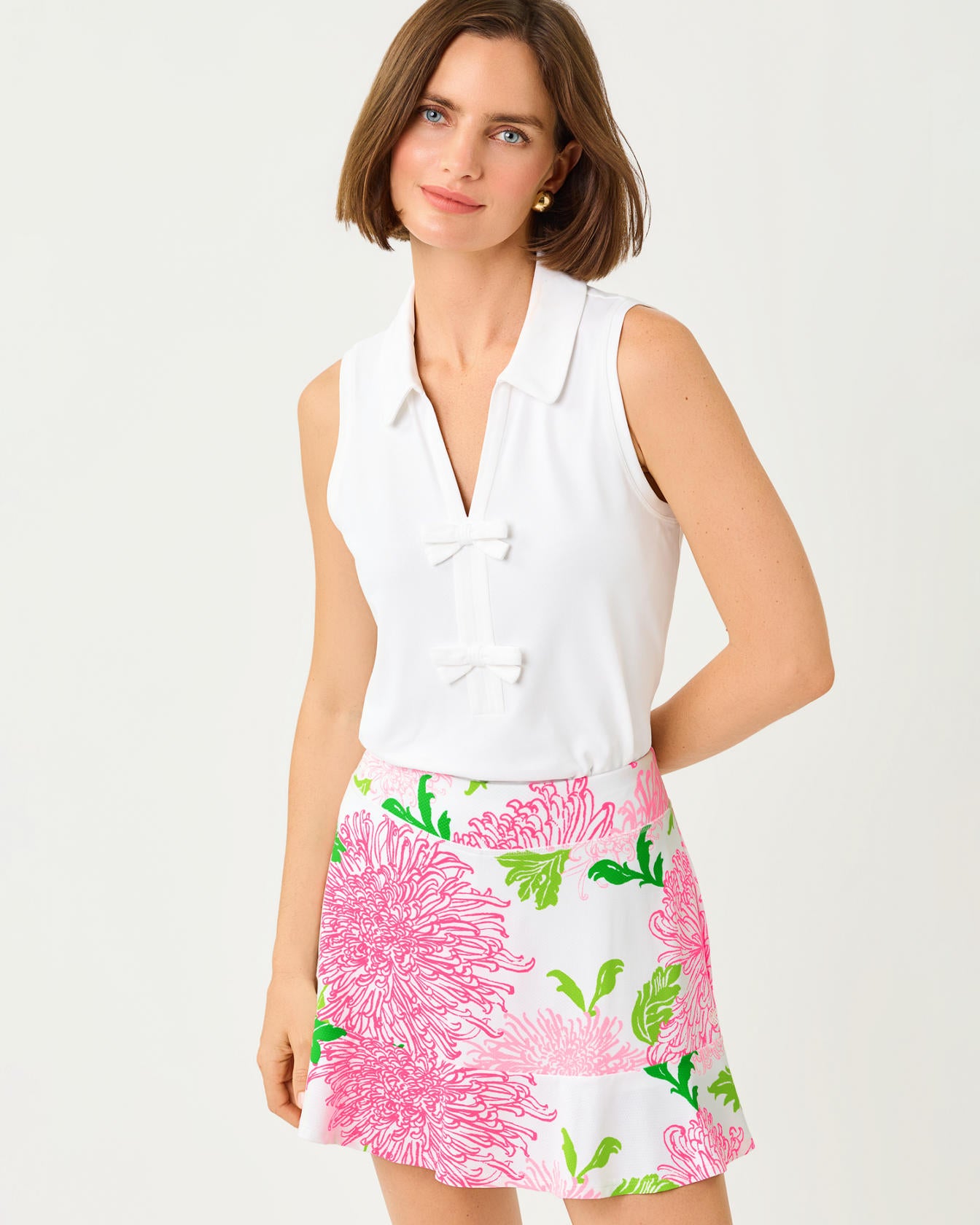 Frida Sleeveless Bow Polo In Resort White